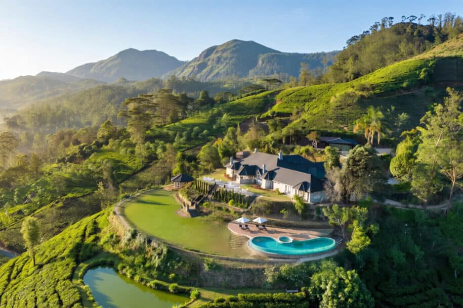Regenerative tourism Sri Lanka: tea-estate eco-lodge and pool amid terraced highland tea fields